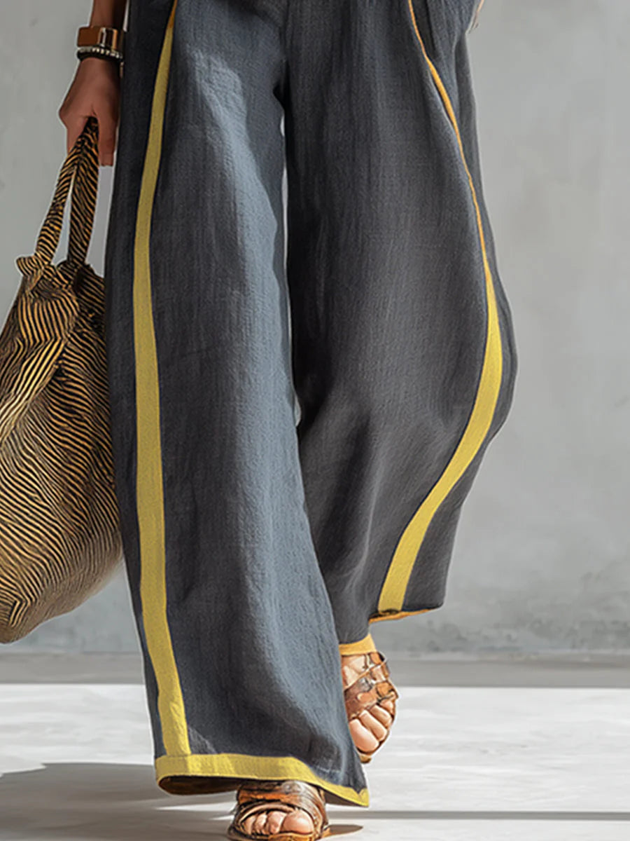 Leila - Elegante y casual conjunto de chaleco y pantalón de algodón y lino gris con ribete bicolor.